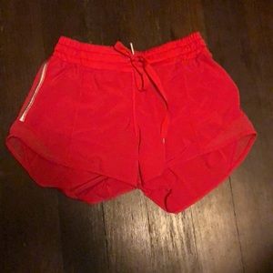 Lululemon pinky red hotty hot shorts 3”